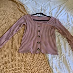 Button down form fitting blouse.
